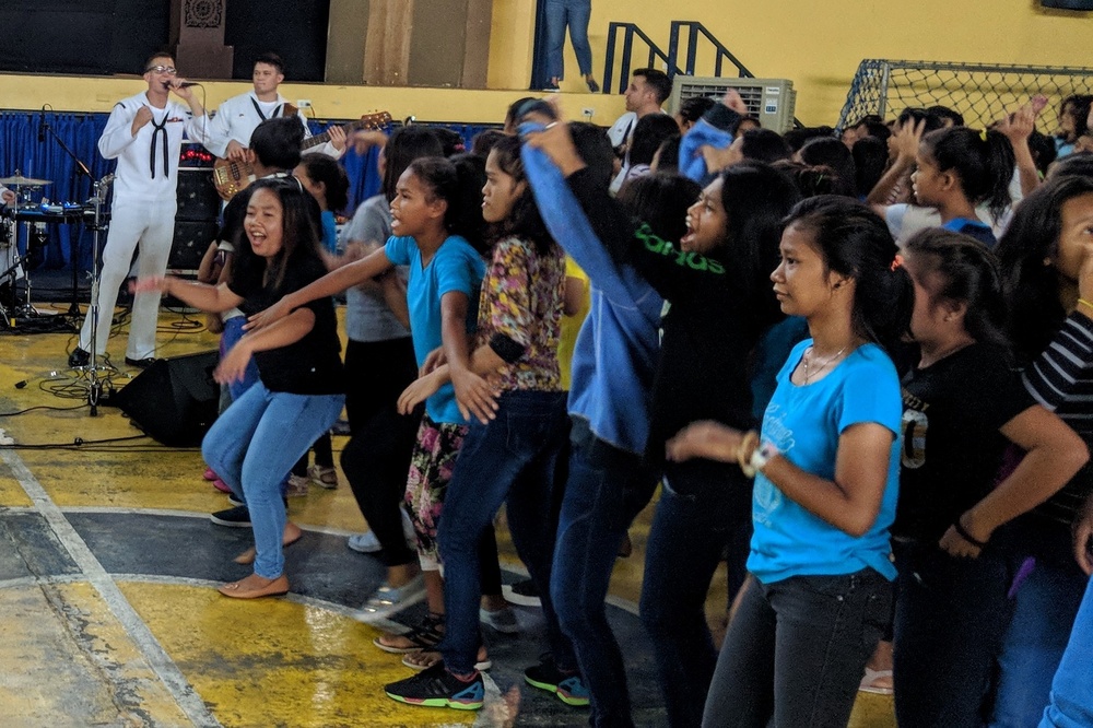 U.S. 7th Fleet Band performs for Don Bosco street children in Manila