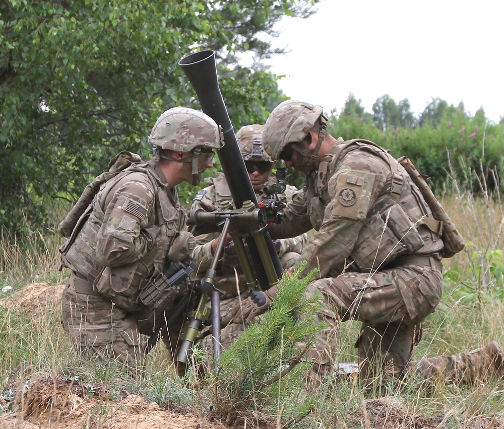 U.S. soldiers calibrate mortar system during Saber Strike 18