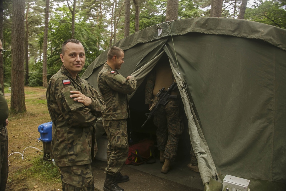 BLT 2/6 Corpsmen, Polish Land Forces medics interact during BALTOPS