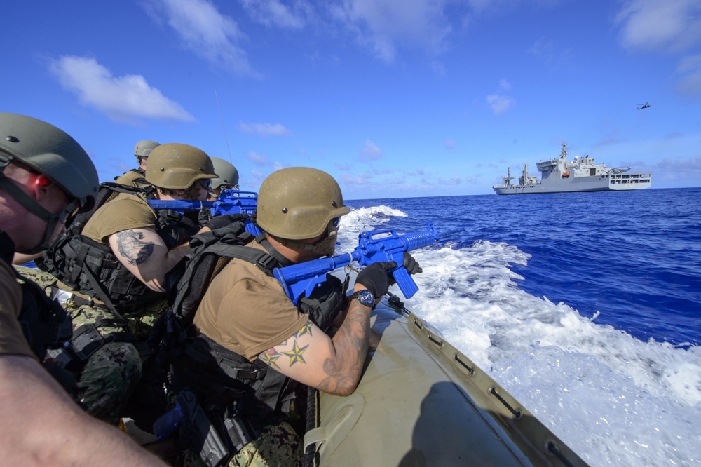 USS Antietam (CG 54) Sailors approach the INS Shak ti (A 57) for a visit, board, search and seizure (VBSS) traiing exercise during Malabar 2018