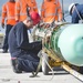 Frank Cable Assists with Torpedo On-Load