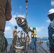 Frank Cable Assists with Torpedo On-Load