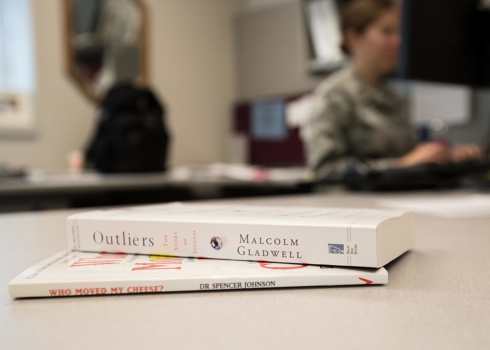 Airmen gain professional development through book club.