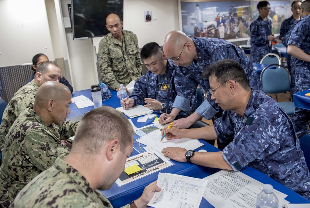 USNS Mercy and JMSDF Sailors participate in table top exercise
