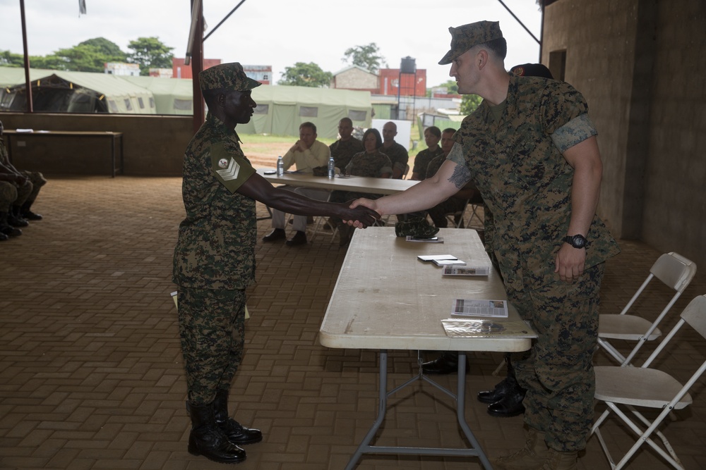 TSC Uganda Holds Graduation for UPDF, Turns Over Vehicles and Equipment