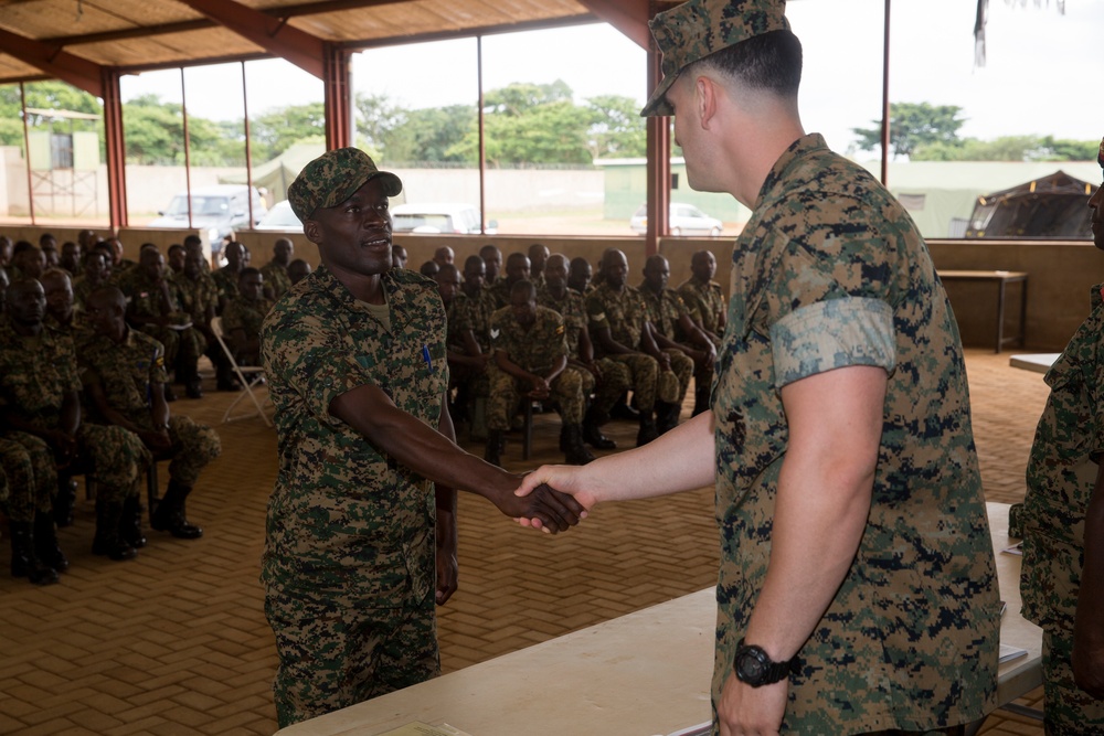 TSC Uganda Holds Graduation for UPDF, Turns Over Vehicles and Equipment