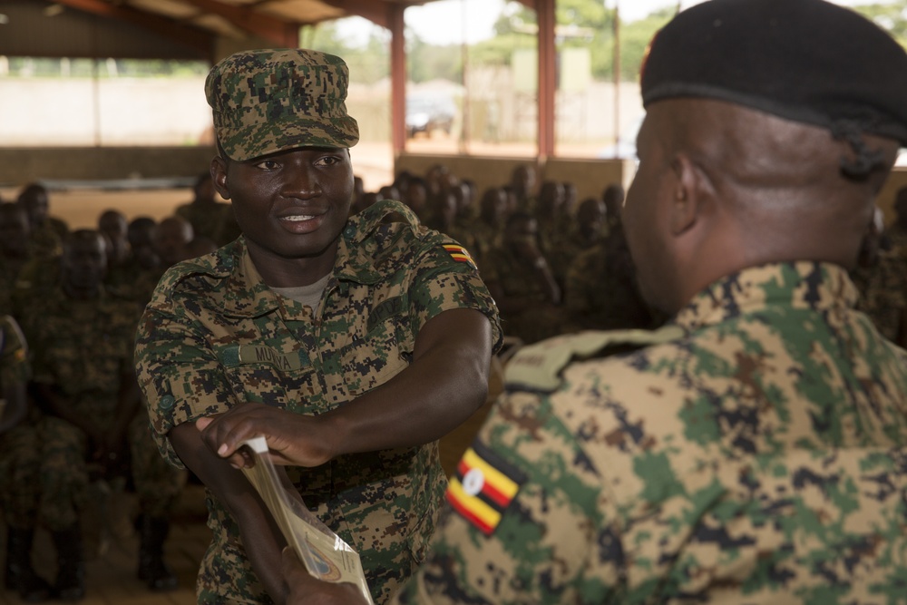 TSC Uganda Holds Graduation for UPDF, Turns Over Vehicles and Equipment