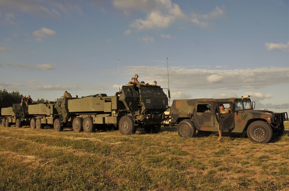 M142 High Mobility Artillery Rocket System (HIMARS) firing during Saber Strike 18