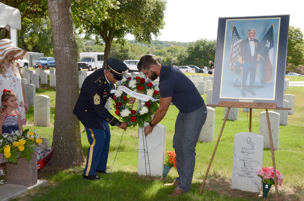 placing a wreath