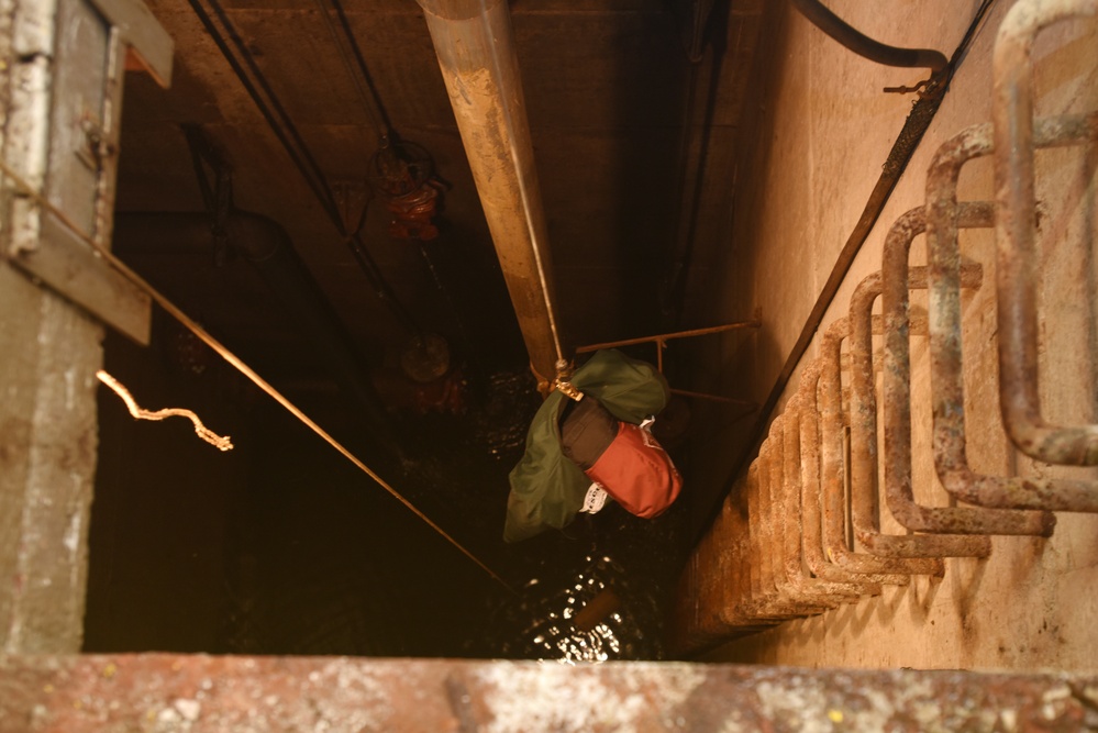 District dangles dummy to get smart on confined space safety