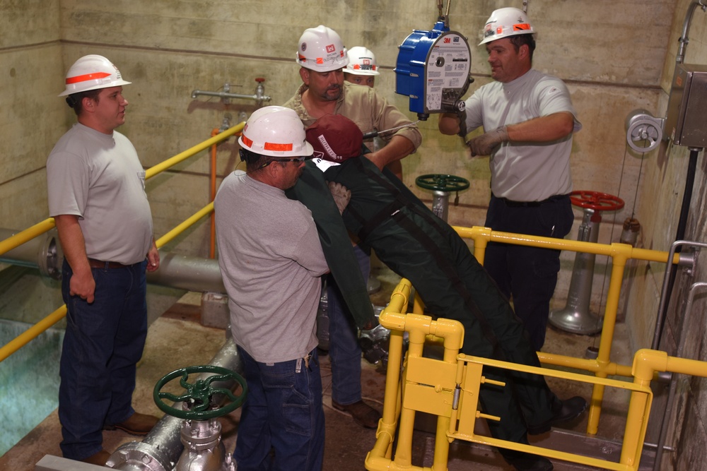 District dangles dummy to get smart on confined space safety