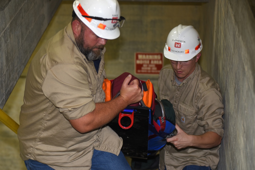 District dangles dummy to get smart on confined space safety