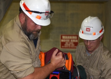 District dangles training dummy to get smart on confined space safety