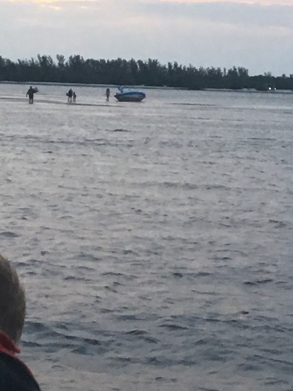 Coast Guard assists 4 adults, 2 children from aground boat near Sanibel Island