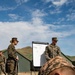 U.S Marine Lance Corporals Brandi Moser and Alex Terrazas, both military policeman with 3rd Law Enforcement Battalion, III Marine Expeditionary Force, explain the different dismounted patrols formations to Mongolian Armed Forces soldiers.