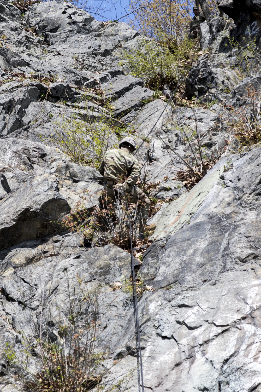 Trainers set up rappel lanes at Camp Smith Training Site