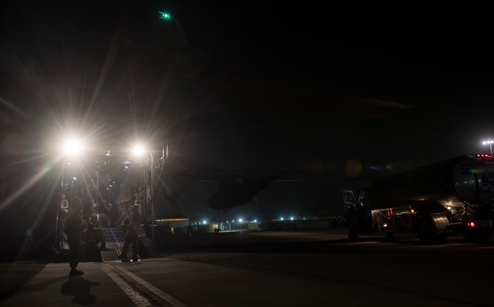 The 379th Expeditionary Aeromedical Evacuation Squadron takes a lift on a C-130 Hercules