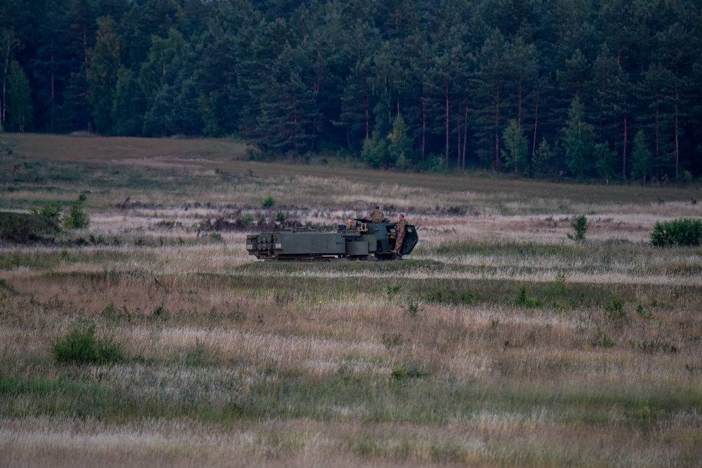 M142 High Mobility Artillery Rocket System (HIMARS) firing during Saber Strike 18