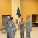 1st Lt. Maria Del Rio, new commander of the 200th Public Affairs Detachment, 93rd Troop Command, New Mexico Army National Guard, holds the unit's colors at attention during the PAD's change-of-command ceremony.