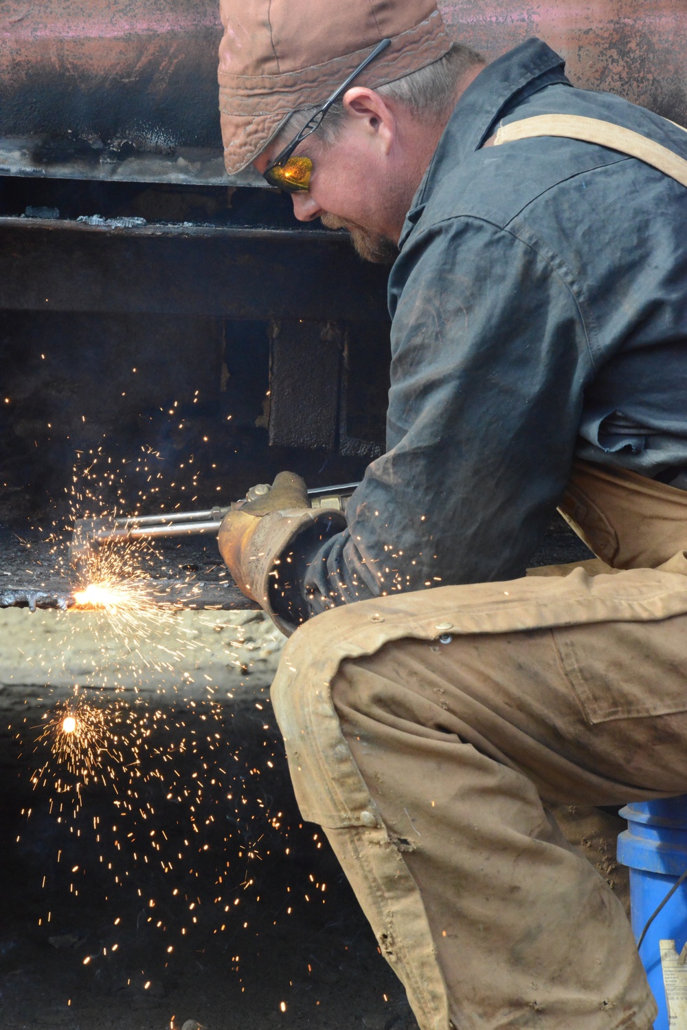 Coast Guard marine vessel inspectors enforce regulations for gold dredging inspections in Nome, Alaska