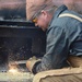 Coast Guard marine vessel inspectors enforce regulations for gold dredging inspections in Nome, Alaska