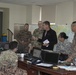 Pelle Rosdahl, peacekeeping subject matter expert, works with the multinational lower control operations center staff.