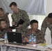 Peacekeepers from the U.S. Navy and Army work alongside their Mongolian Armed Force counterpart.