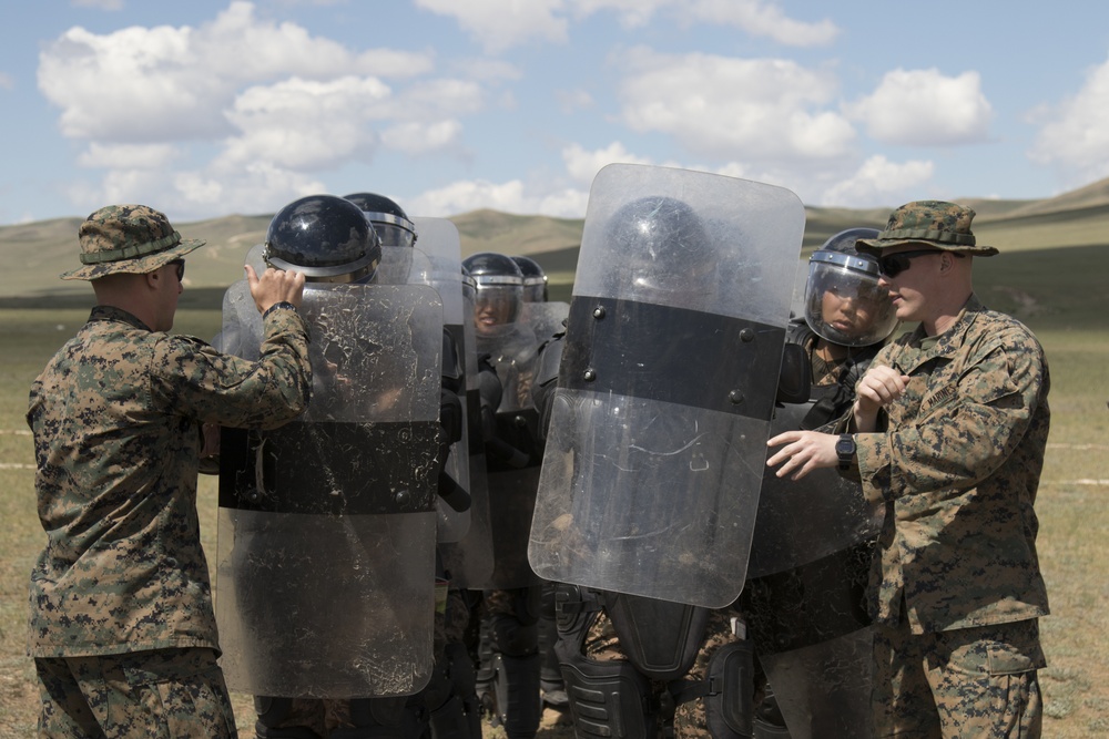 Marines teaching Mongolian Armed Forces crowd control.