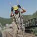 SD, Suriname Soldiers partner together to rebuild trail bridge