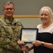 Defense Logistics Agency Troop Support Commander Army Brig. Gen. Mark Simerly (left) is presented a certificate of appreciation by Pam Henshall, president of the Greater Northeast Philadelphia Chamber of Commerce in Philadelphia on June 18.