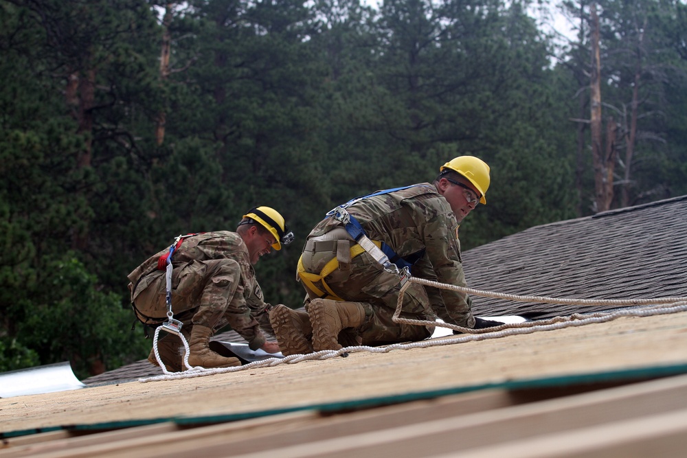 National Guard Soldiers improve community playhouse