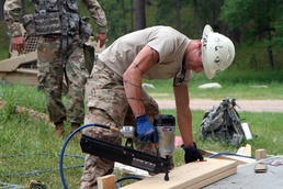 National Guard Soldiers improve community playhouse