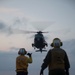 “Hueys” and “Cobras” land on the USS Arlington