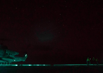 “Hueys” and “Cobras” land on the USS Arlington