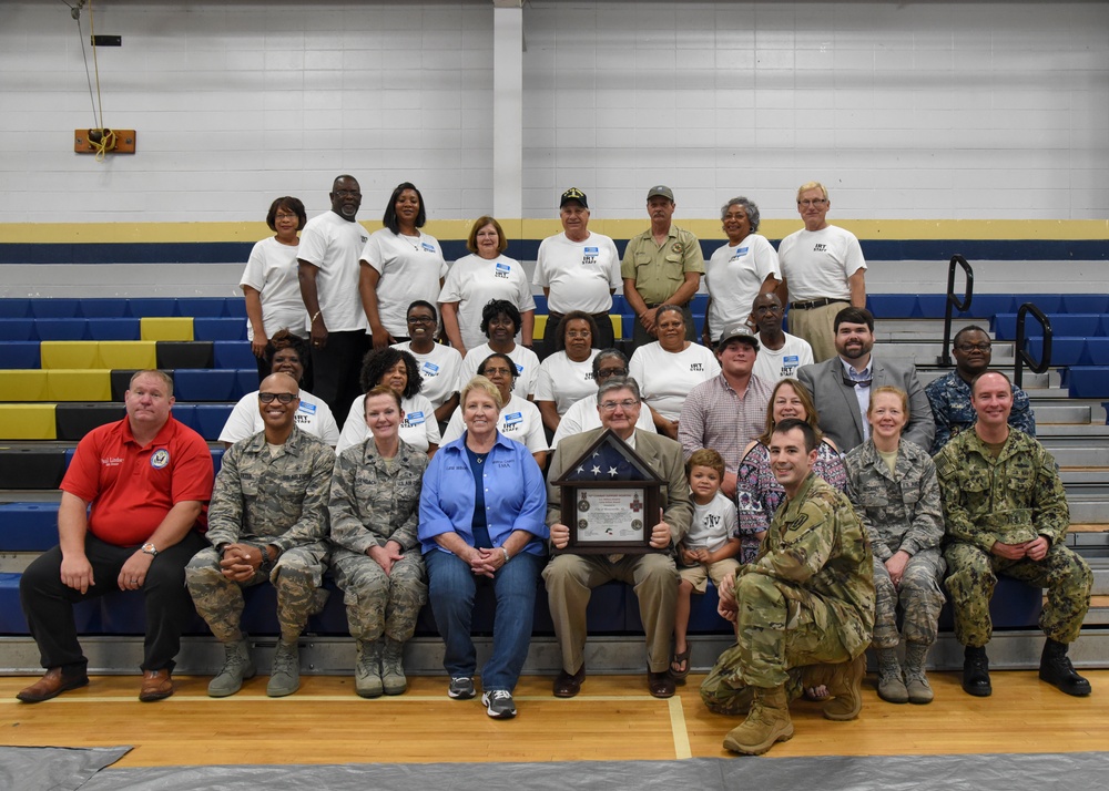 Volunteers pose for photo