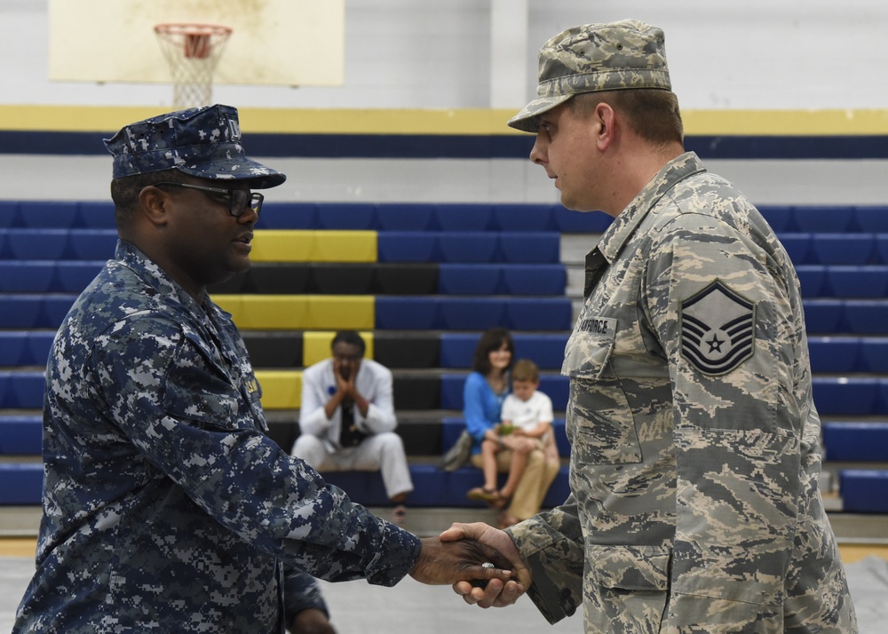 Master Sgt. Wastart get coin for hard work