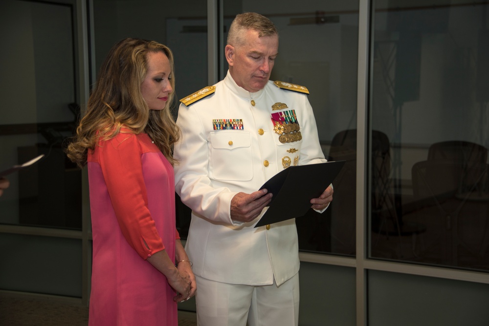 Coast Guard recognizes spouse for heroic actions