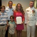 Coast Guard recognizes spouse for heroic actions