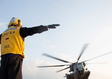 CH-53E flight operations on the USS Arlington