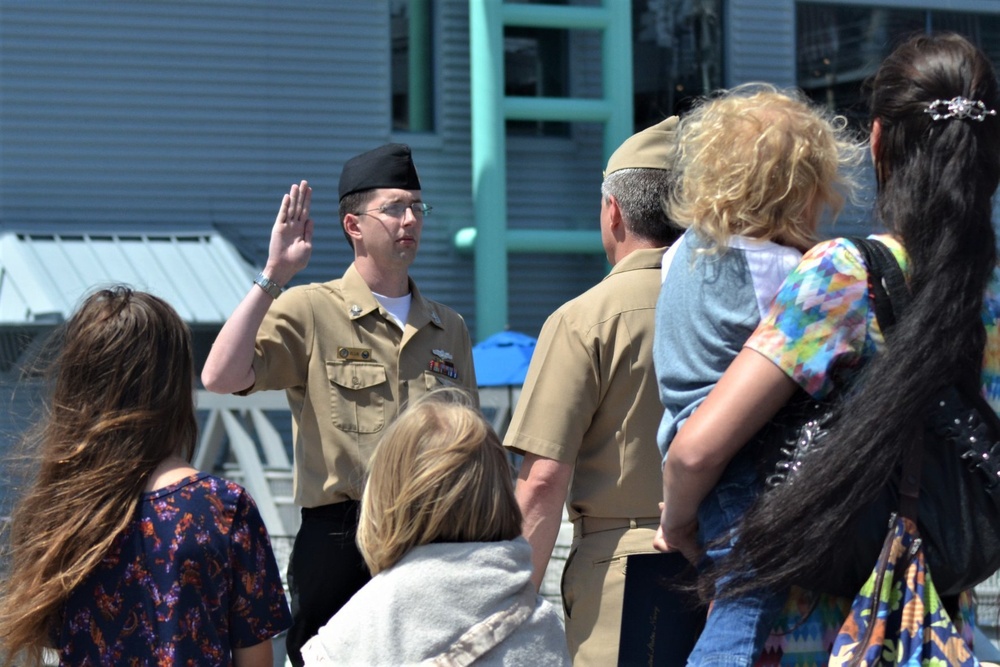 Family members watch Re-Enlistment aboard USS Wisconsin