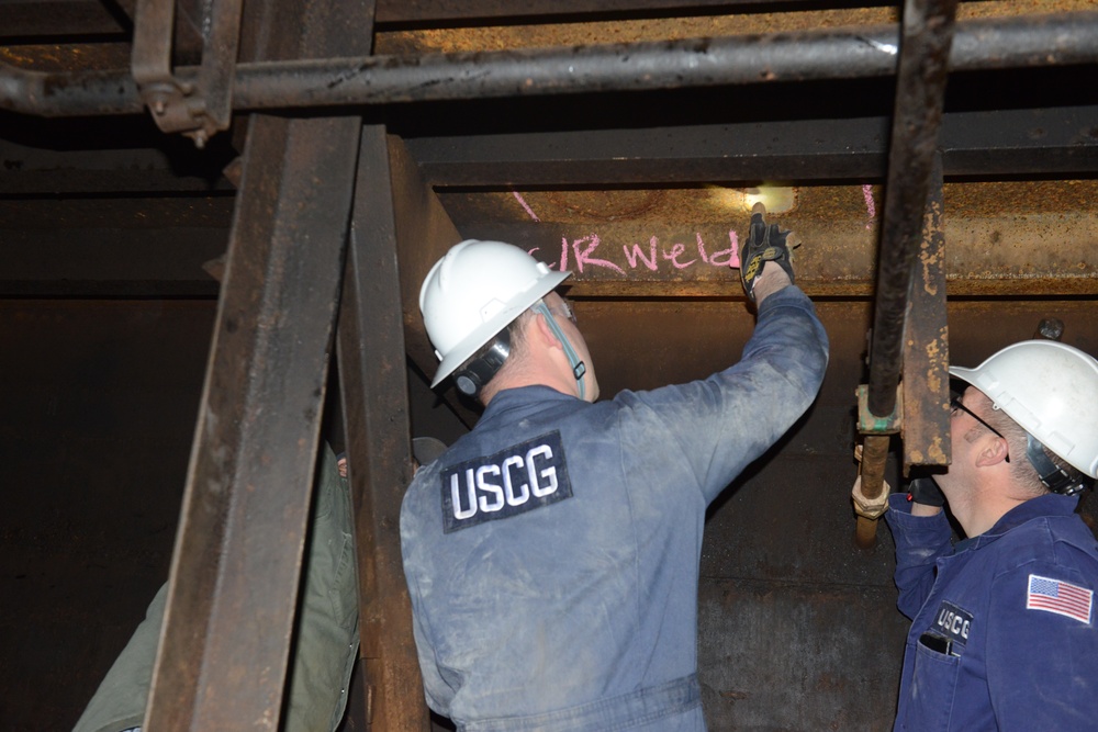 Coast Guard marine inspectors conduct gold dredge vessel inspections in Nome, Alaska