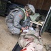 U.S. Army Reserve Soldiers with 865th Combat Support Hospital, based in Utica, N.Y., perform patient evaluations as part of a mass casualty exercise during Regional Medic CSTX 86-18-04.