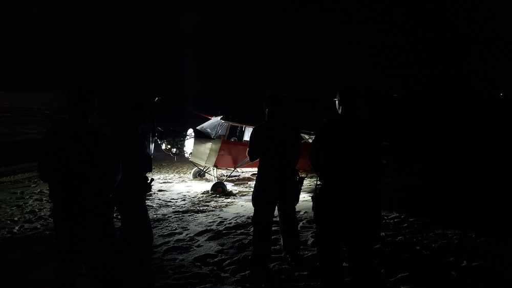 Coast Guard Training Center Searching for Pilot after Plane Lands on Secured Beach