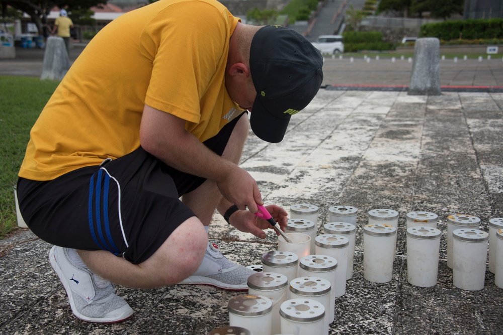 Sailors Give Light to Peace Memorial Park