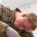 Pfc. Baker draws blood during the physical health assessment