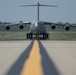 375th LRS Airmen unload C-17