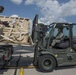 375th LRS Airmen unload C-17