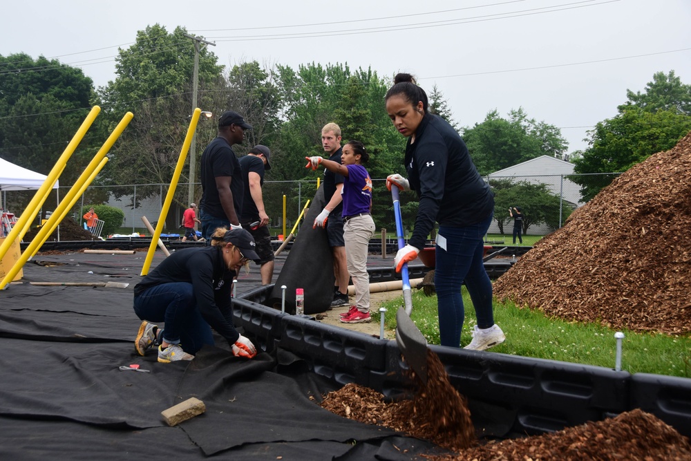 Sailors, community build playground for kids