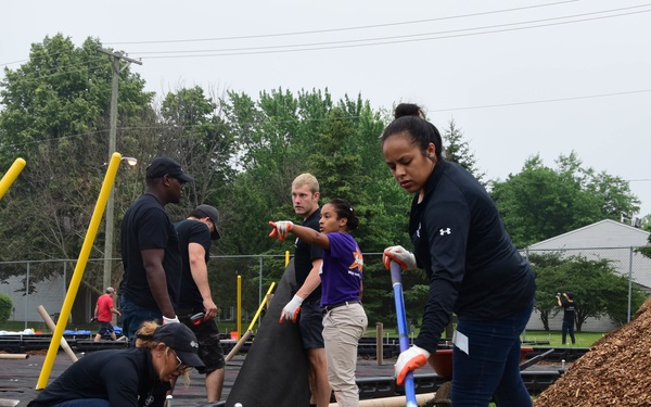 Sailors, community build playground for kids