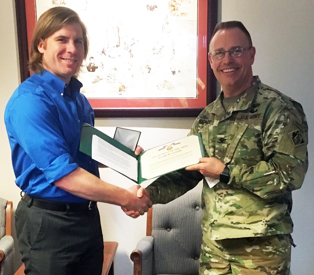 Gonglik receives honor for work in Thailand